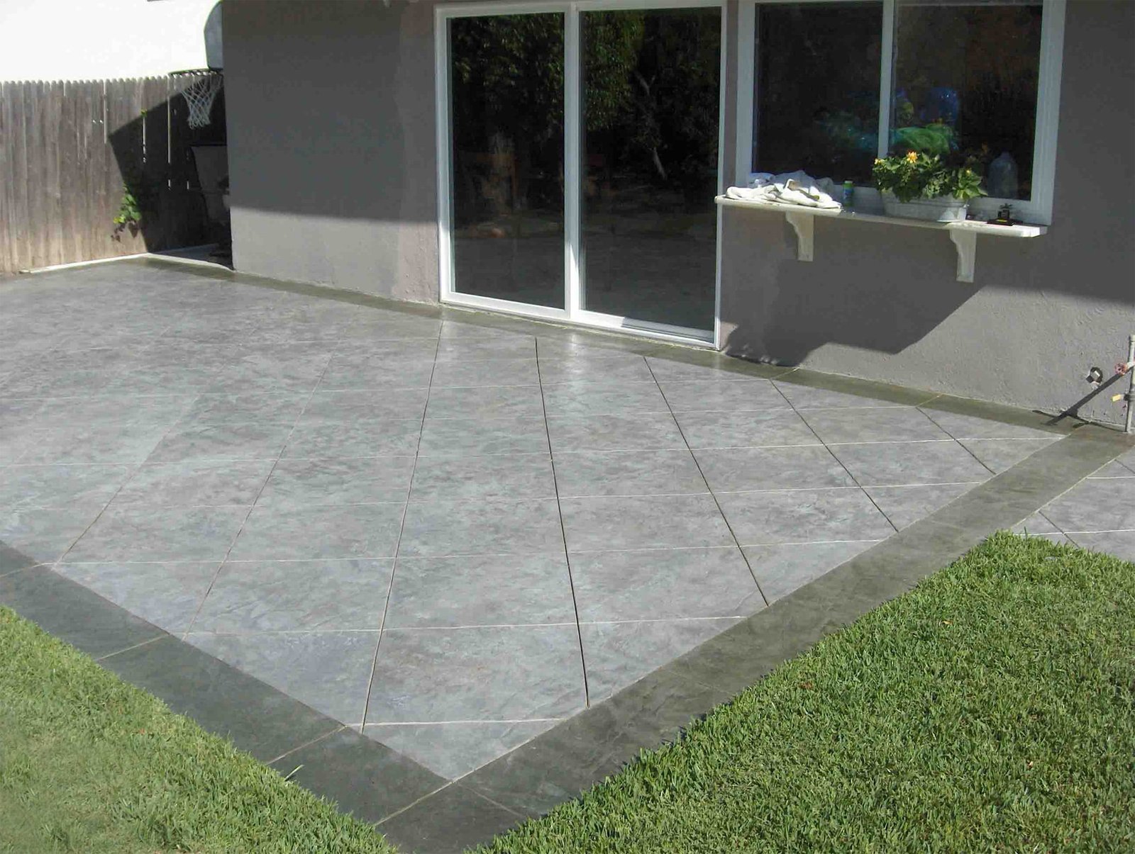 Concrete patio stamped from a fresh concrete pour.